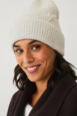 Ellos Collection Strikhue med sløjfedetaljer i perle creme Clearance