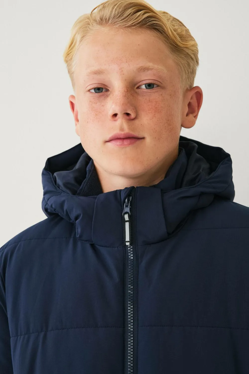 Ellos Overtøj>Collection Vandafvisende pufferjakke med aftagelig hætte Marinblå